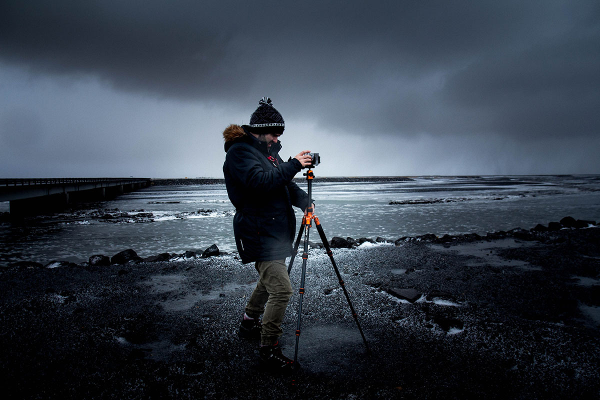 using tripod to shoot waterfall in iceland