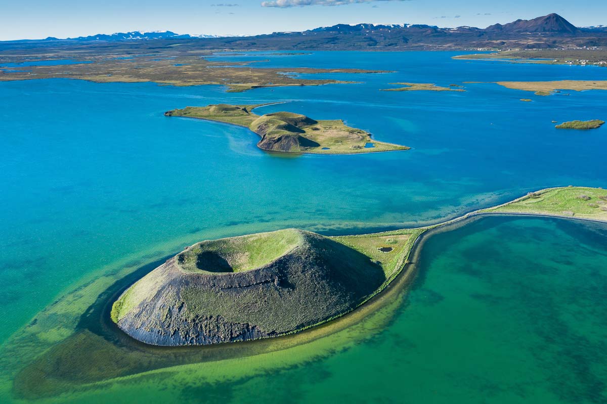 Landscape of Lake Myvatn with green pseudocraters and islands at.Popular tourist destination in north of Iceland, Europe