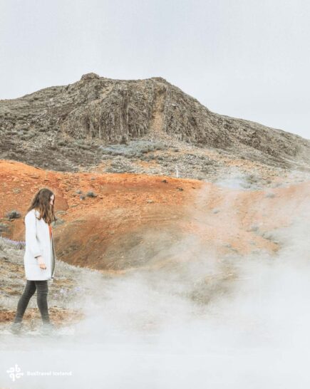 Walk past bubbling mud pool and steaming geysers