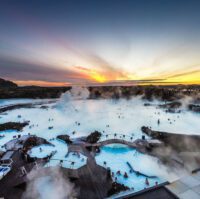 enjoy a soak at Blue Lagoon at sunset