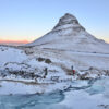 Kirkjufell mountain and waterfall in winter