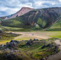 hikers amazed by the breathtaking landscape in Landmannalaugar highland