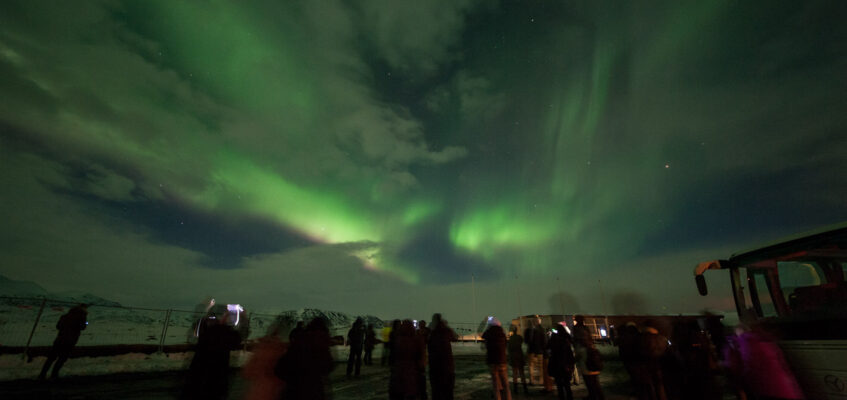 People watching the Northern Lights