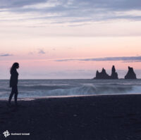 Walking on Reynisfjara black sand beach