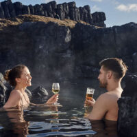 People having drinks at Sky Lagoon geothermal spa