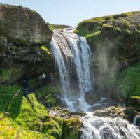 waterfall in Bersekjahraun lava fields in summer