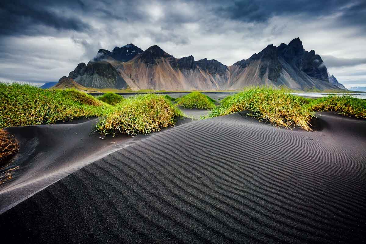 Great wind rippled beach black sand. Picturesque and gorgeous scene. Popular tourist attraction. Location famous place Stokksnes cape, Vestrahorn (Batman Mountain), Iceland, Europe. Beauty world.