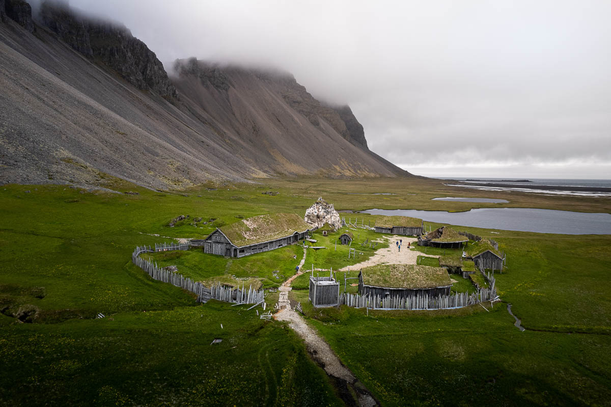 Scenic view of a viking village in Iceland surrounded by rocky hills
