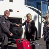 people boarding Keflavik airport shuttel bus