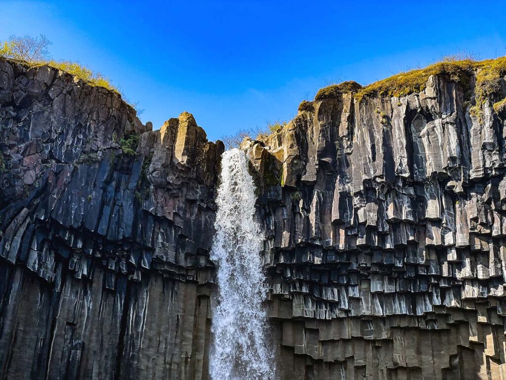 Guide to Svartifoss Waterfall in South Iceland - BusTravel Iceland