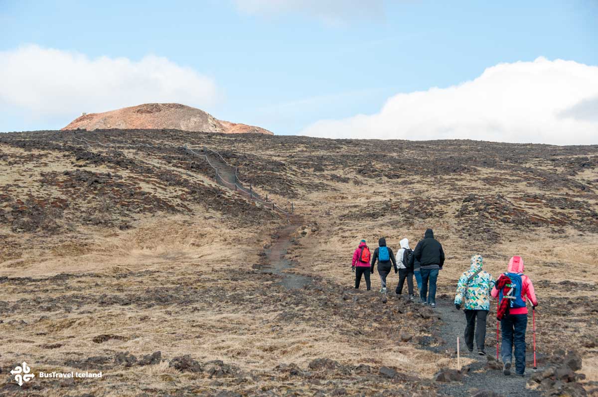 Take a moderate hike to Thrihnukagigur.