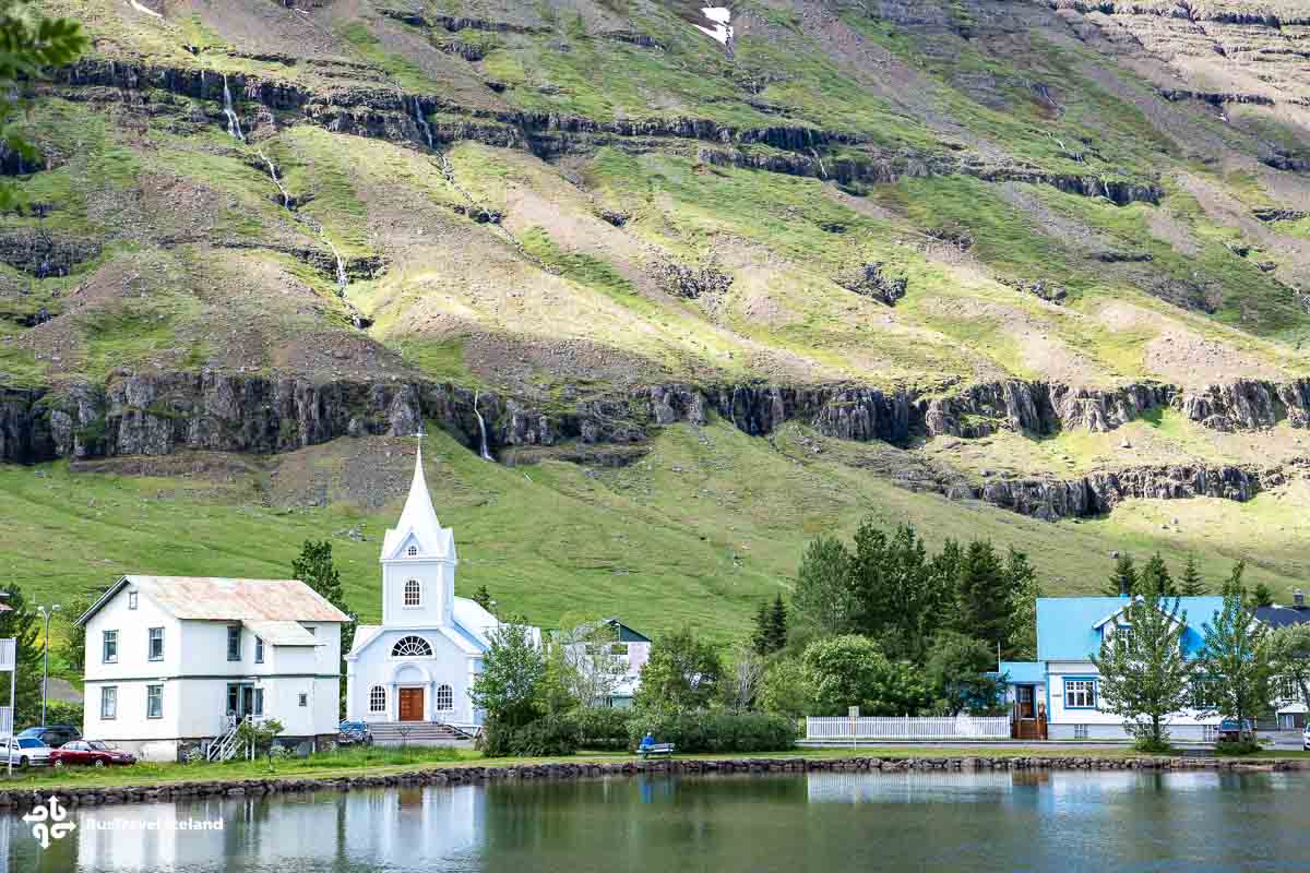 Seyðisfjörður in East Iceland-0417 Seyðisfjörður is a charming Icelandic town known for its colorful wooden houses and vibrant arts scene.