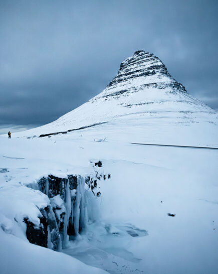 Winter tours in Iceland - snow covered Kirkjufell mountain and waterfall snaefellsnes
