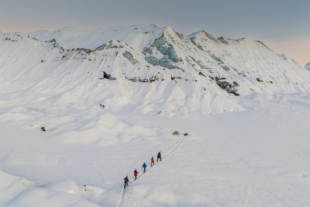 Gravel Travel Katla Ice Cave December 2024-18 Walking in snow towards the ice cave, South Iceland.