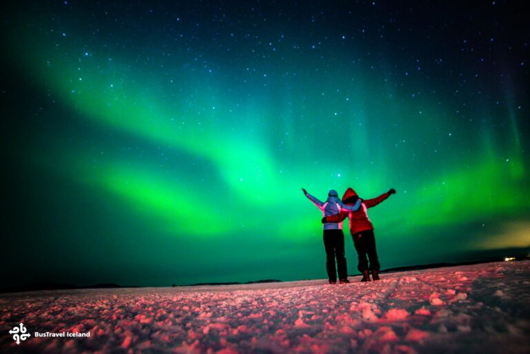 underneath the Northern Lights in Iceland